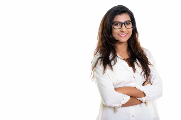 Studio shot of young happy Persian woman smiling while wearing e — Stock Photo, Image