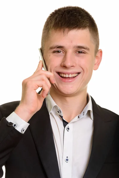 Rostro de joven hombre de negocios feliz sonriendo y hablando en el móvil ph — Foto de Stock