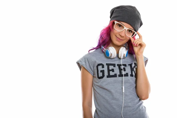 Estúdio tiro de geek menina segurando óculos com fones de ouvido arou — Fotografia de Stock