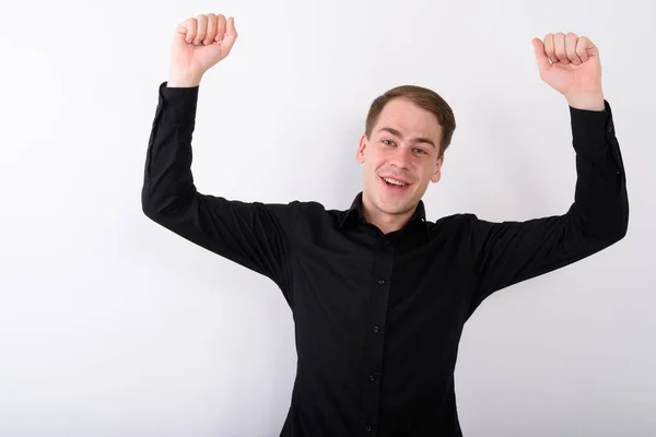 Joven hombre de negocios guapo contra fondo blanco — Foto de Stock