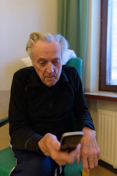 Senior man relaxing at nursing home in Turku, Finland — Stock Photo, Image