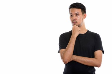 Stüdyo çekim Asyalı gencin distanc bakarken düşünüyorum