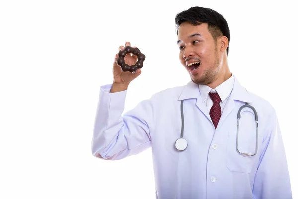 Студія постріл щасливі азіатських юнак доктора посміхаються при holdin — стокове фото