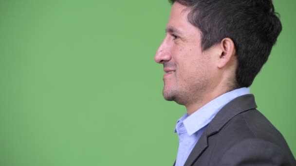 Headshot profil Visa spansktalande affärsman leende — Stockvideo