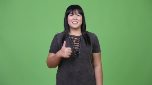 Szczęśliwy nadwagę kobieta azjatyckich daje kciuk w — Wideo stockowe