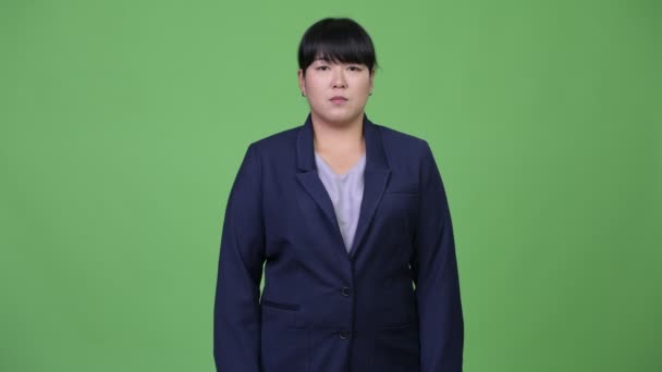 Hermosa mujer de negocios asiática sobrepeso — Vídeos de Stock