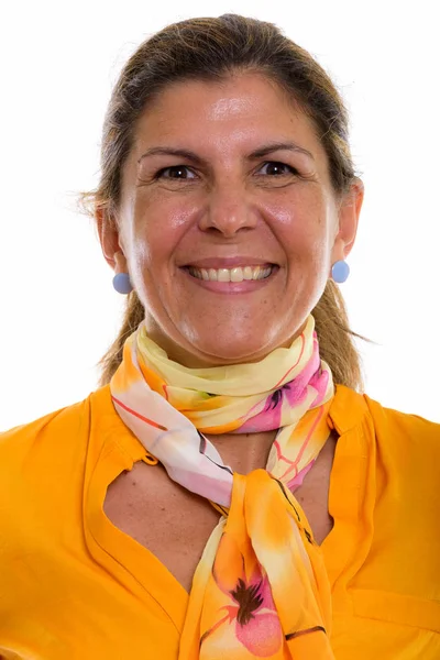 Face of mature happy businesswoman smiling while wearing scarf — Stock Photo, Image