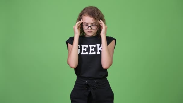 Young stressed nerd woman having headache — Stock Video