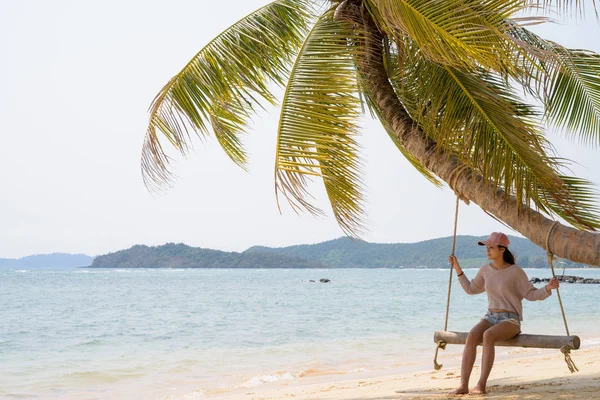 stock image Young beautiful Asian tourist woman relaxing at the beach