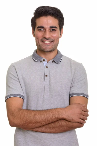 Nuori komea persialainen mies valkoista taustaa vasten — kuvapankkivalokuva