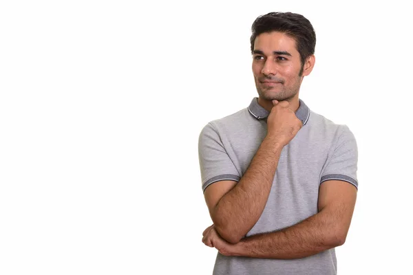 Jovem bonito persa homem contra branco fundo — Fotografia de Stock