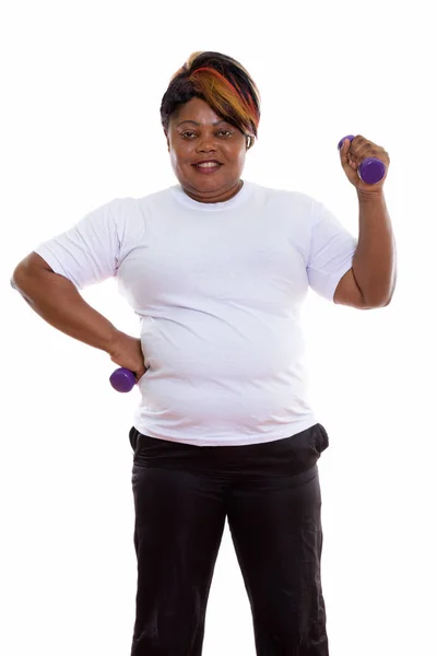 Studio colpo di felice grasso nero africano donna sorridente e standin — Foto Stock