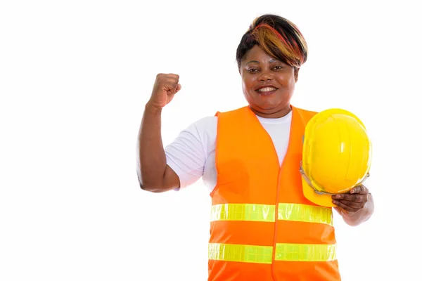 幸せな脂肪黒人女性建設労働者のスタジオ撮影 — ストック写真