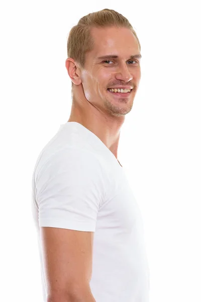 Studio shot of happy young handsome man smiling — Stock Photo, Image