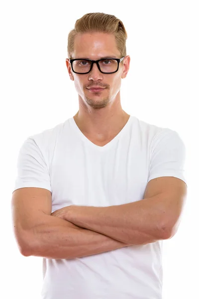 Studio laukaus nuori komea mies yllään silmälasit kädet c — kuvapankkivalokuva