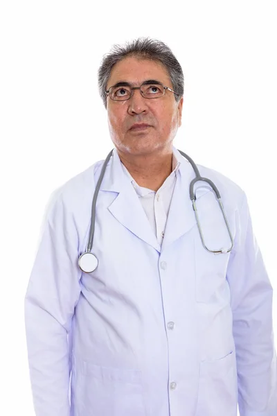 Photo de Studio de médecin senior homme Perse pensant tout en regardant — Photo