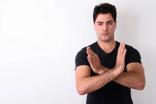 Joven hombre persa guapo sobre fondo blanco —  Fotos de Stock