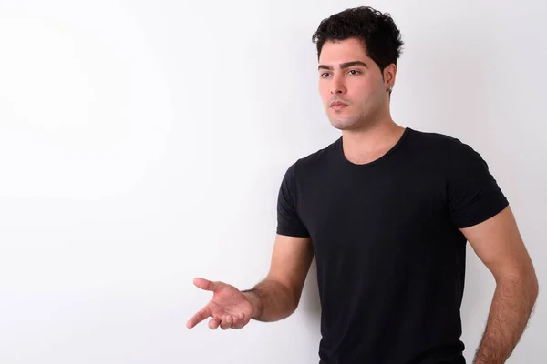 Joven hombre persa guapo sobre fondo blanco —  Fotos de Stock