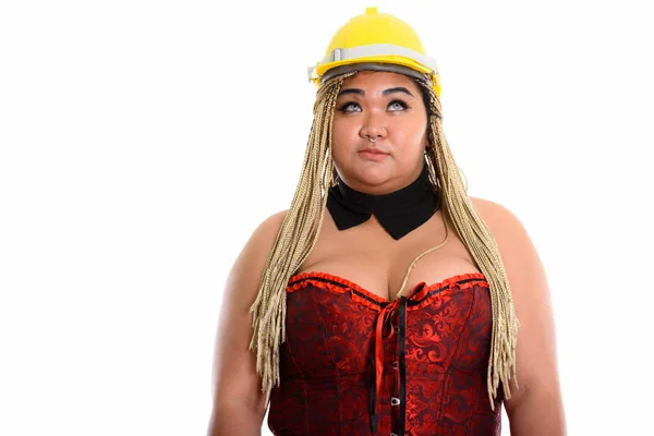 Studioaufnahme von jungen fetten asiatischen Bauarbeiterin trägt sexy c — Stockfoto