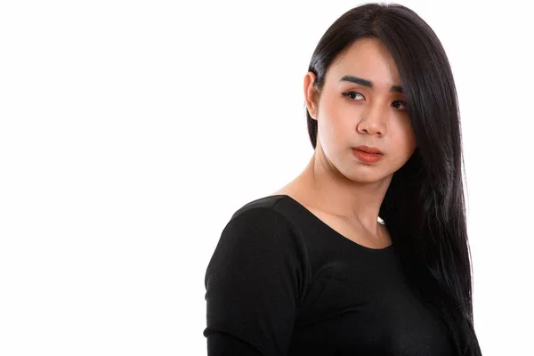Studio shot de jeune asiatique transgenre femme pensée tandis que regarder — Photo