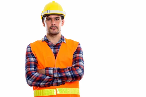 Estúdio tiro de jovem homem persa trabalhador da construção com braços c — Fotografia de Stock