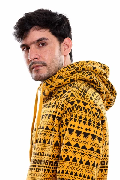Estúdio tiro de jovem persa homem com capuz — Fotografia de Stock