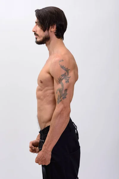 Visão de perfil de belo homem muscular sem camisa — Fotografia de Stock