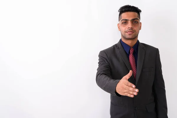 Giovane uomo d'affari indiano indossa tuta contro sfondo bianco — Foto Stock
