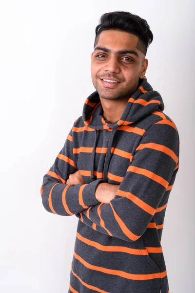 白い背景に、パーカーを着ている若いインド人男性 — ストック写真