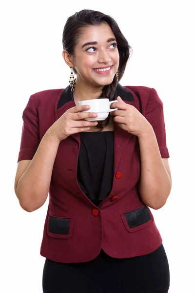 Νέοι ευτυχισμένη Ινδός επιχειρηματίας χαμογελώντας ενώ σκέψης και κρατήστε — Φωτογραφία Αρχείου