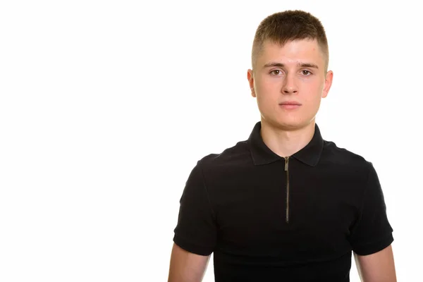 Unga kaukasiska man står mot vit bakgrund — Stockfoto