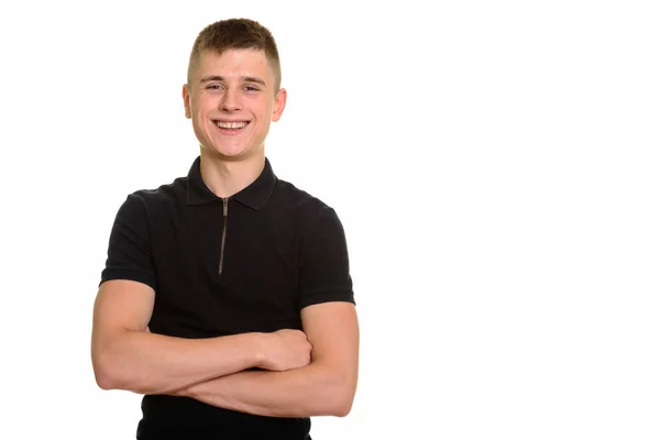 Young happy Caucasian man smiling with arms crossed — Stock Photo, Image