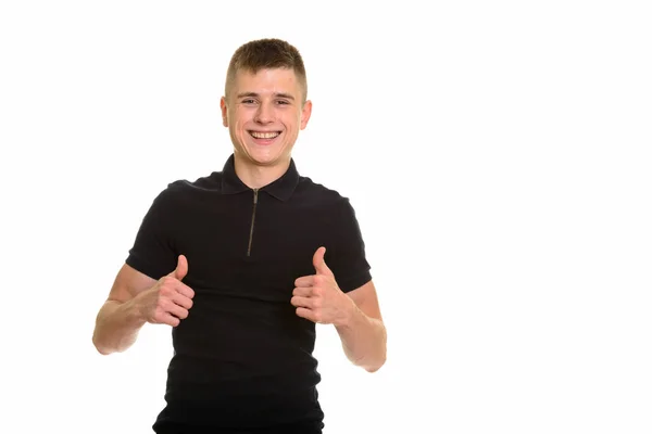 Jeune homme heureux caucasien souriant et donnant pouces — Photo