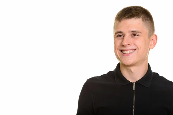 Fiatal boldog fehér férfi mosolyog és gondolkodik — Stock Fotó