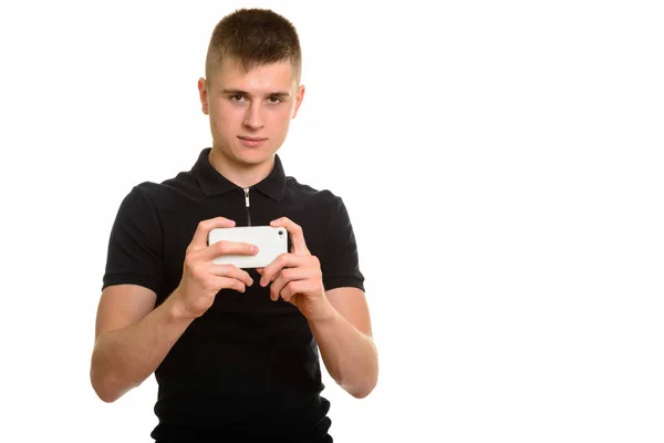 年轻的白人男子用手机拍照 — 图库照片