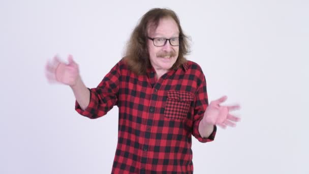 Happy senior hipster man showing surprise gesture — Stock Video