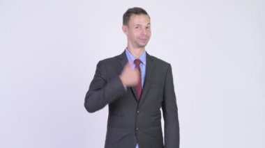 Yaşasın vererek mutlu işadamı stüdyo çekim