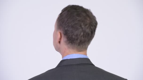 Visão traseira foto de cabeça de homem de negócios à procura de algo — Vídeo de Stock