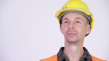 Mutlu bir adam inşaat işçisi düşünme stüdyo çekim
