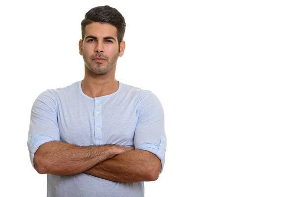 Joven hombre persa guapo con los brazos cruzados —  Fotos de Stock