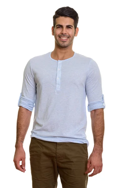 Studio portrait of young handsome Persian man smiling — Stock Photo, Image