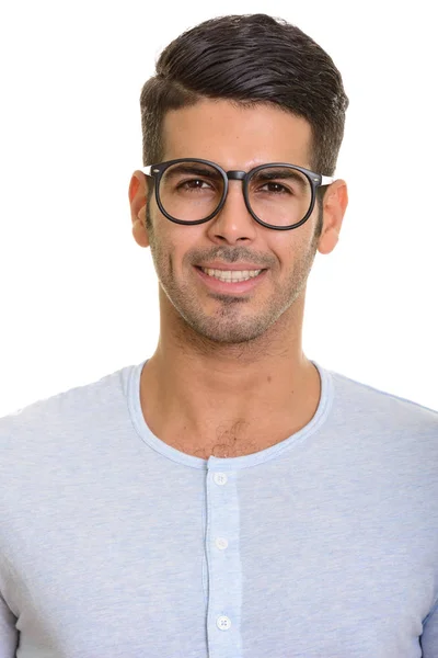 Face of young happy Persian man smiling with eyeglasses — Stock Photo, Image