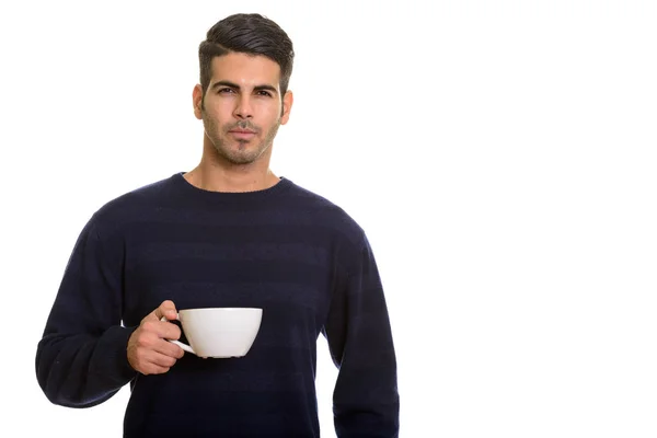 Jonge knappe Perzische man met koffiekop — Stockfoto