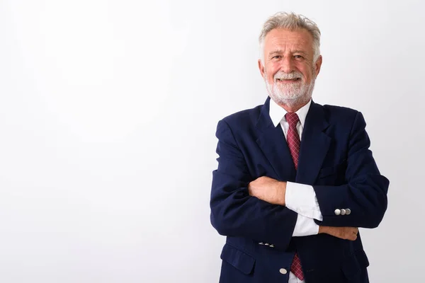 Estúdio tiro de empresário barbudo sênior feliz sorrindo com braço — Fotografia de Stock