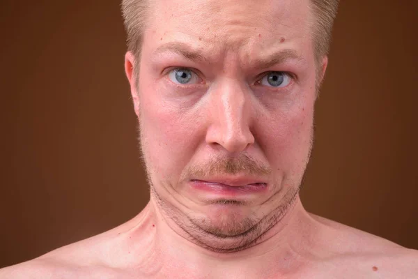 Face of young man with double chin Stock Picture