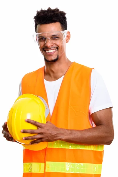 Pensativo feliz Africano homem trabalhador da construção sorrindo enquanto h — Fotografia de Stock