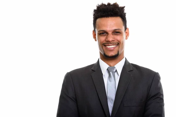 Estudio disparo de joven feliz empresario africano sonriendo — Foto de Stock