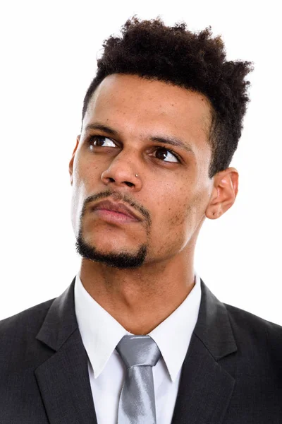 Face of young African businessman thinking while looking up — Stock Photo, Image