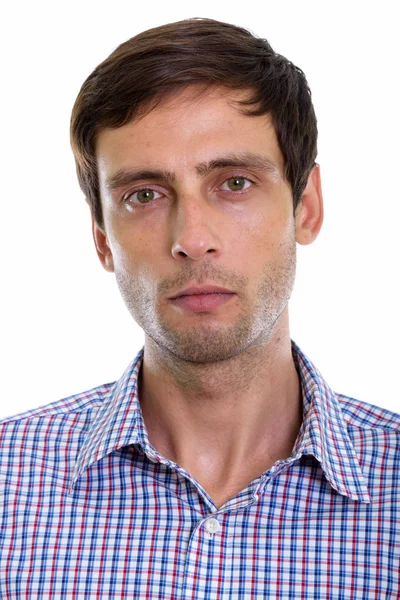 Face of young handsome businessman looking at camera — Stock Photo, Image