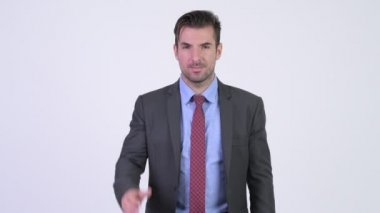 El sıkışma veren genç mutlu İspanyol işadamı